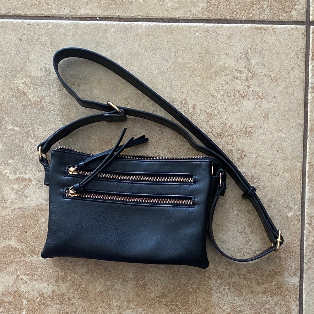 Elegant Black Crossbody Bag with Gold Zippers